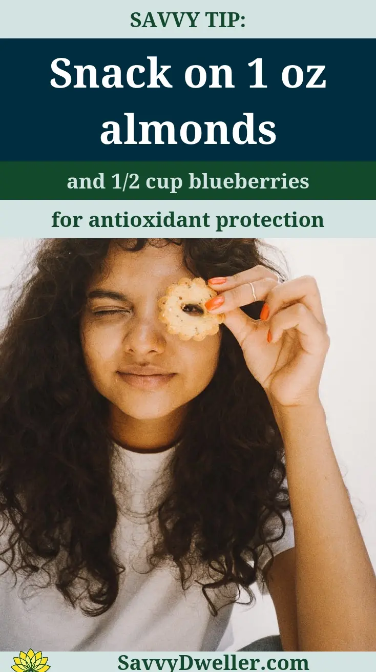 Healthy snacks for better eye health featuring almonds and blueberries, rich in antioxidants.