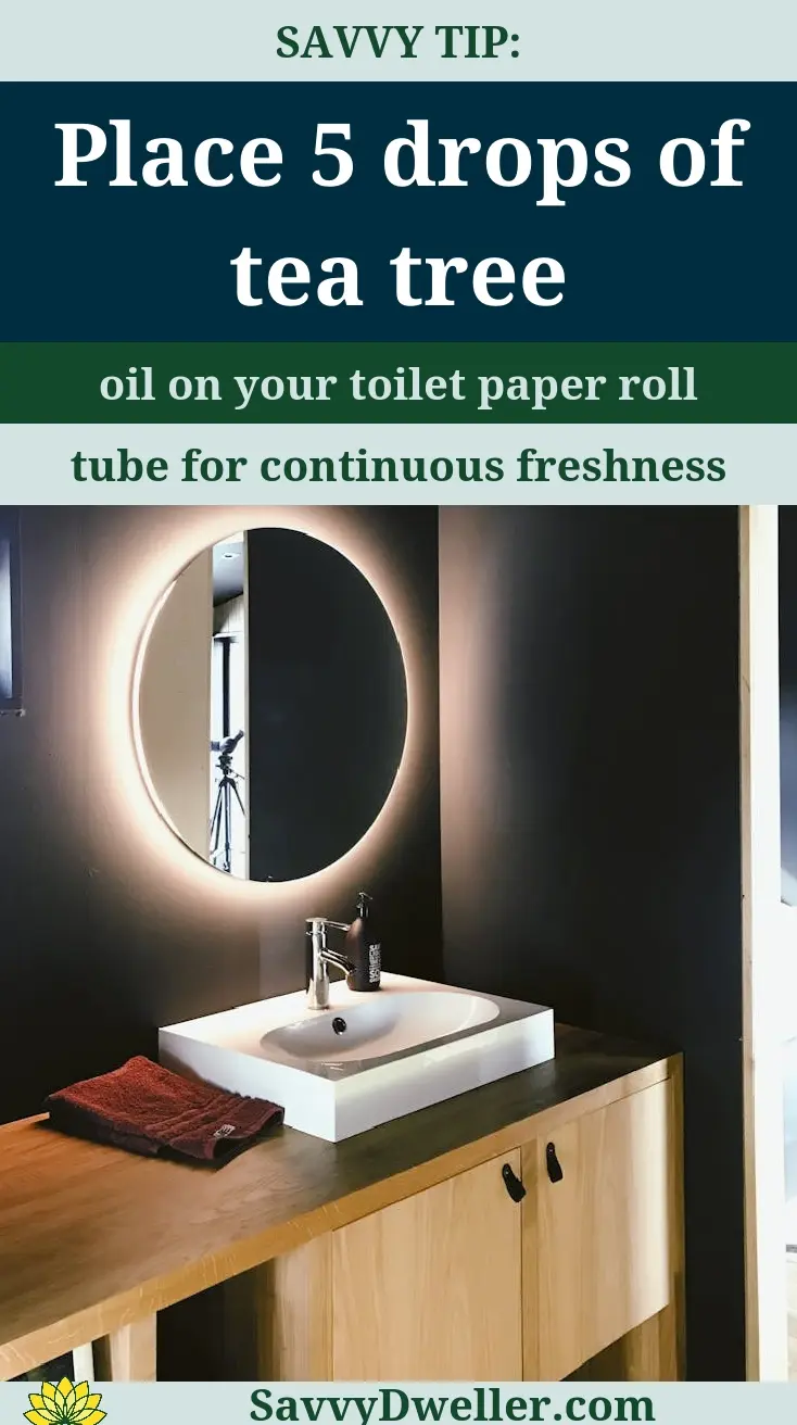 Tea tree oil drops on toilet paper roll for a fresh smelling bathroom.