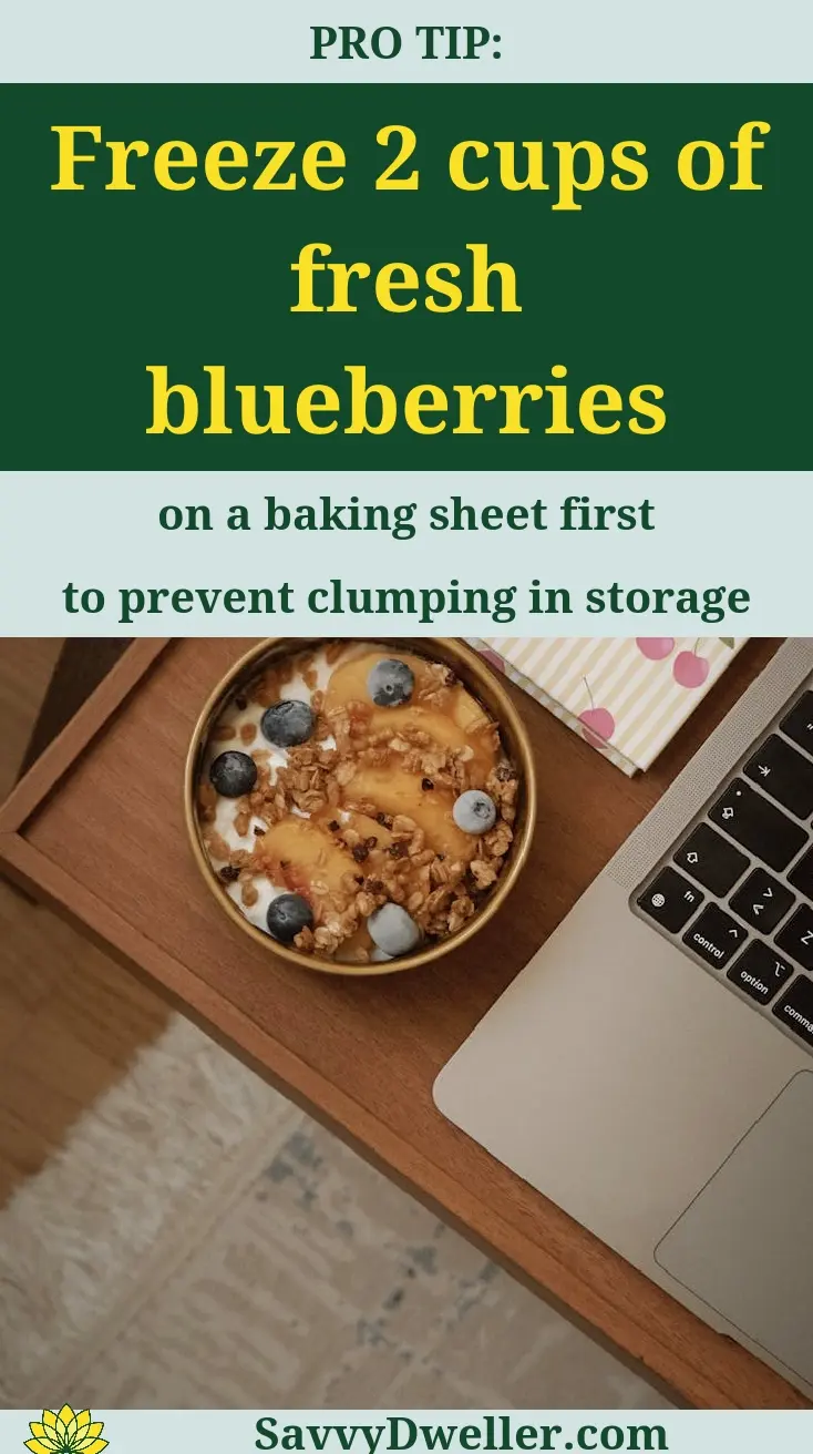 Fresh blueberries on a baking sheet to prevent clumping, antioxidant-rich food