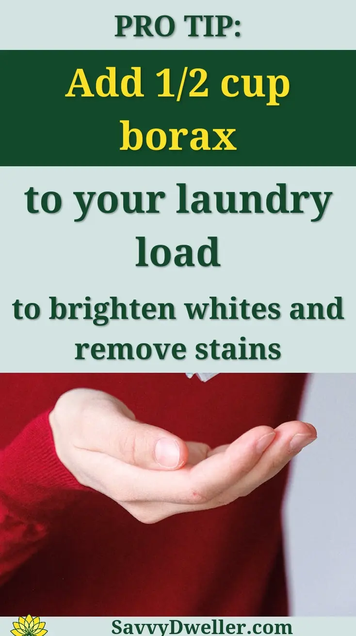 A woman in a red sweater applies hand sanitizer indoors for hygiene and prevention.