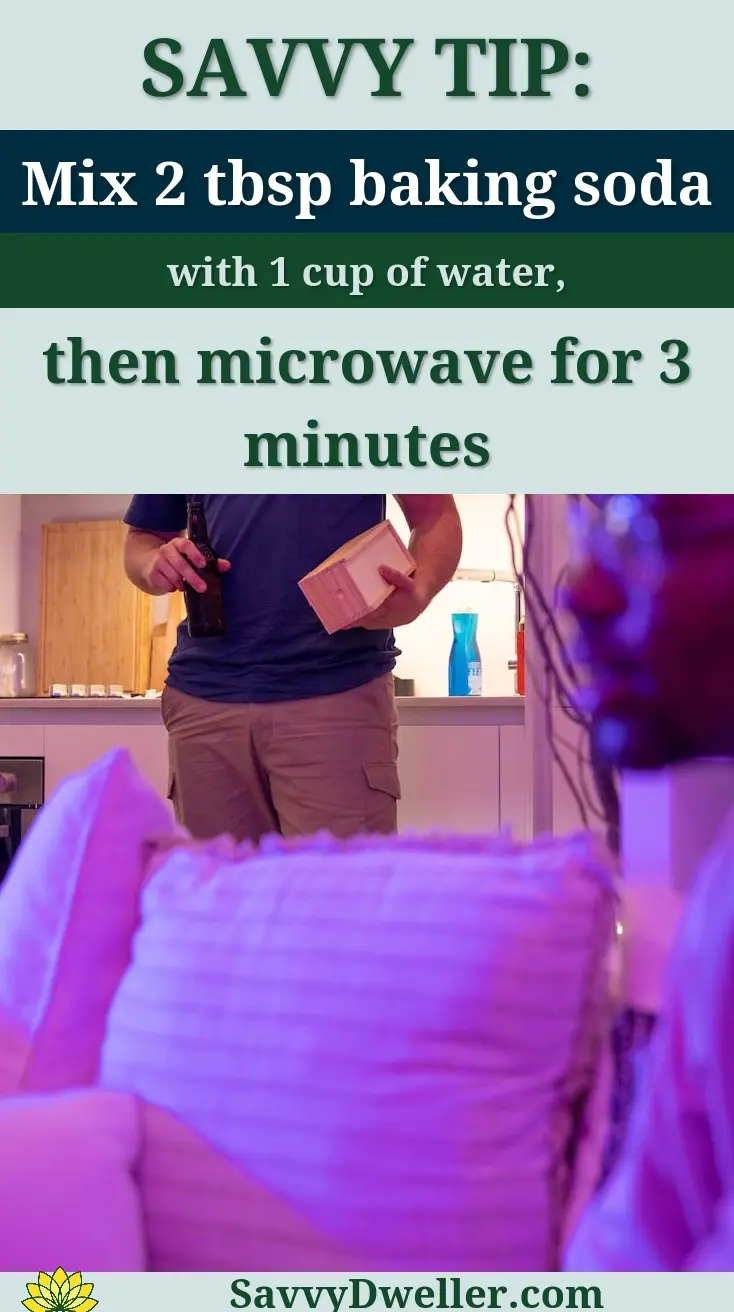 Two people enjoying a casual evening indoors with drinks and casual attire.