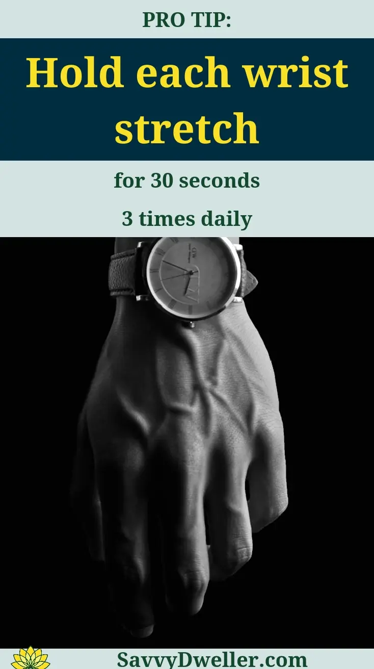 Hand performing a wrist stretch to relieve carpal tunnel pain