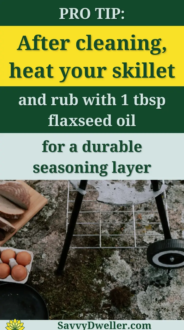 Delicious bacon strips grilling outdoors, accompanied by eggs and bread, perfect for a rustic meal.