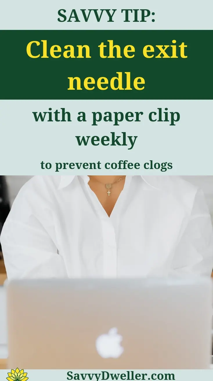 A person providing tips on how to clean a Keurig machine to improve coffee taste, focusing on cleaning the exit needle