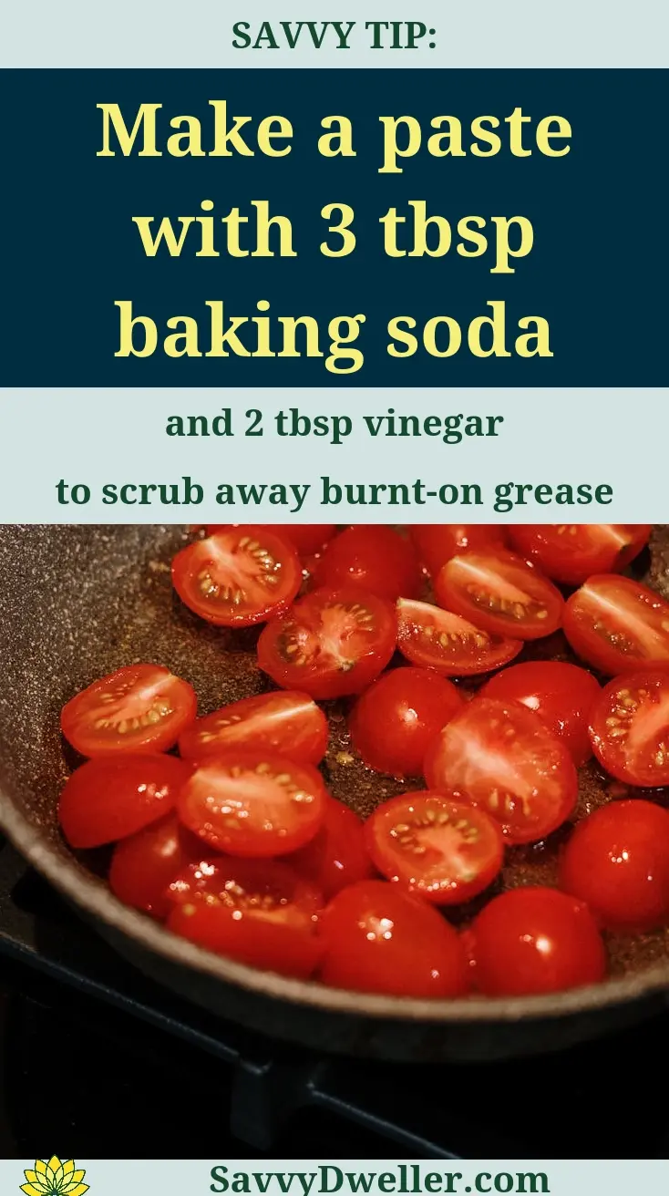 Stovetop grate being cleaned with a paste made from baking soda and vinegar, effective for gas stoves.