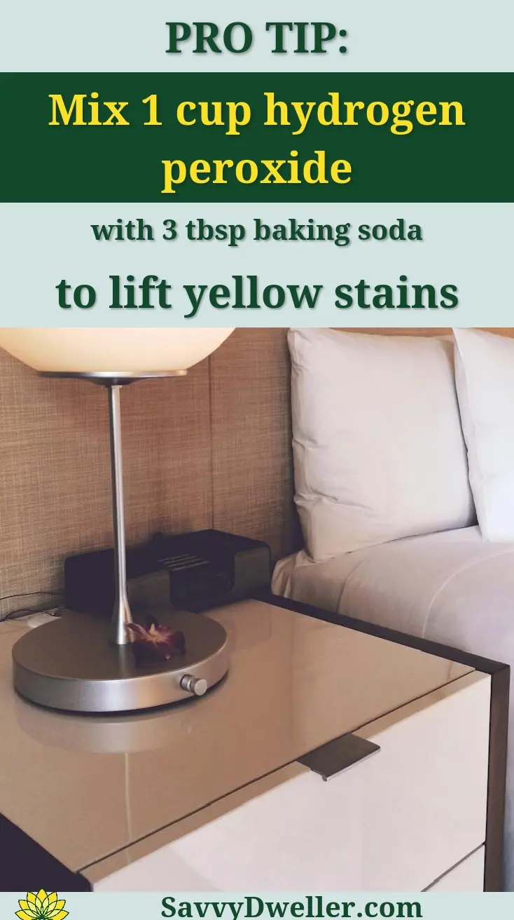 Stylish hotel room featuring soft lighting, elegant bedding, and modern furnishings for a cozy stay.