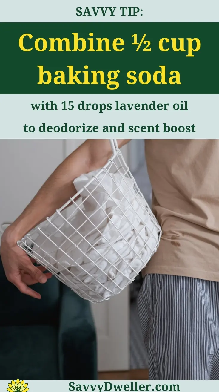 A person holding a basket with laundry and a tip about combining baking soda and lavender oil for a DIY laundry scent booster.