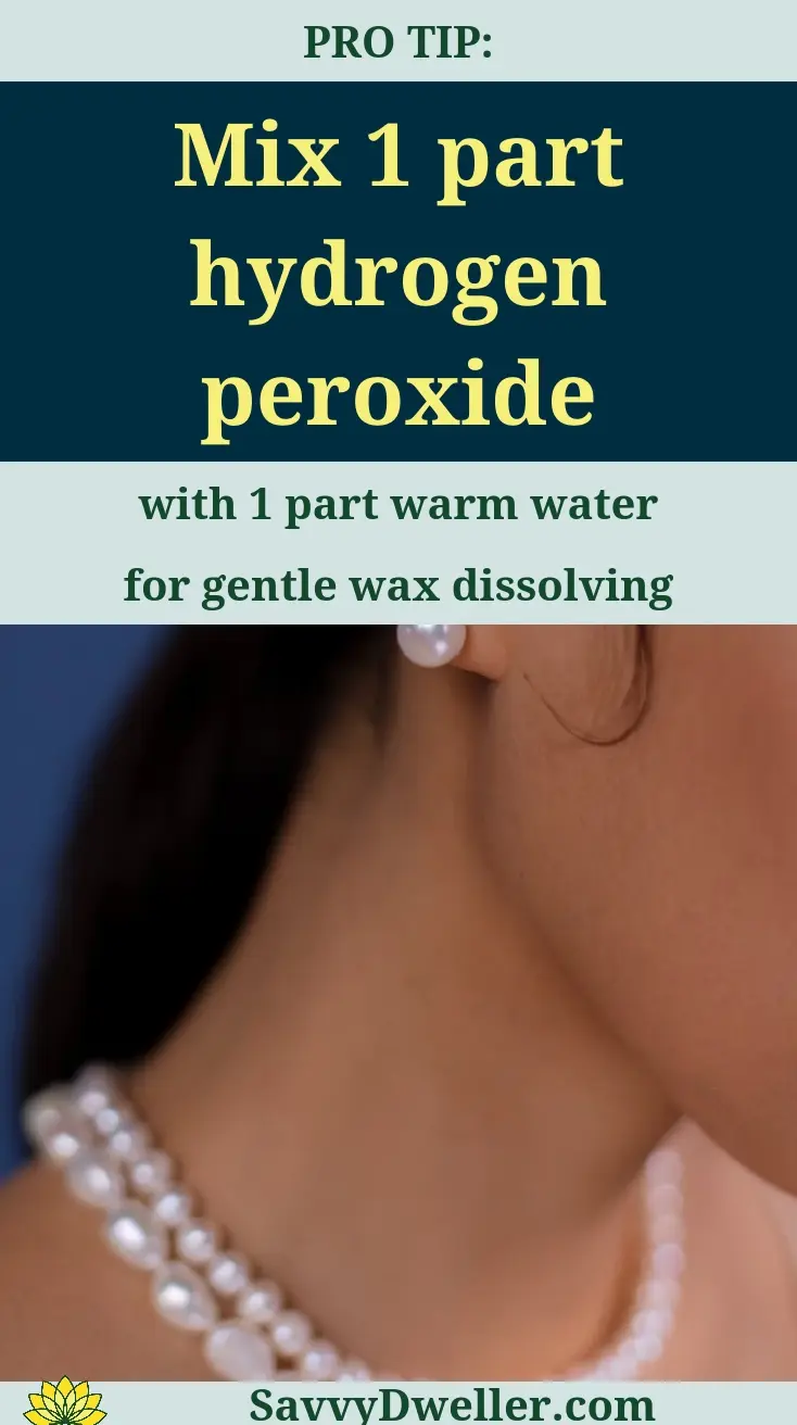 Mixing hydrogen peroxide and warm water for ear wax removal at home.