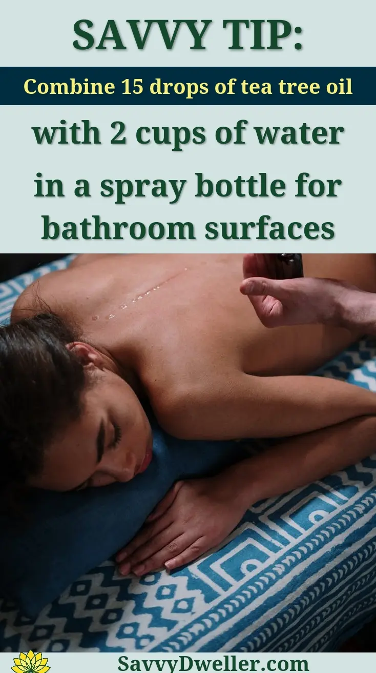 Woman enjoying a relaxing massage with essential oils in a cozy spa setting.