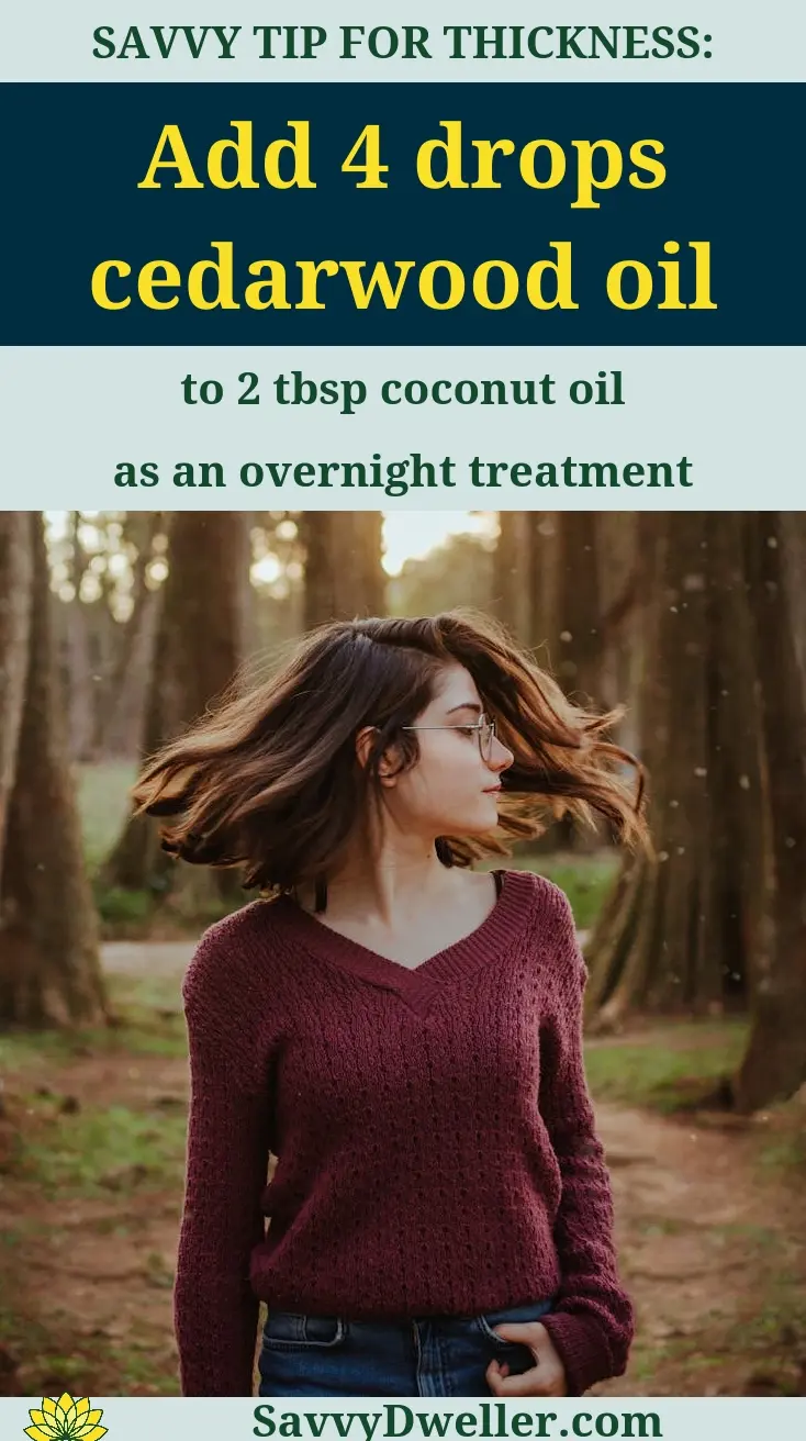 A woman with flowing hair in a forest, showcasing the benefits of essential oils for hair growth.