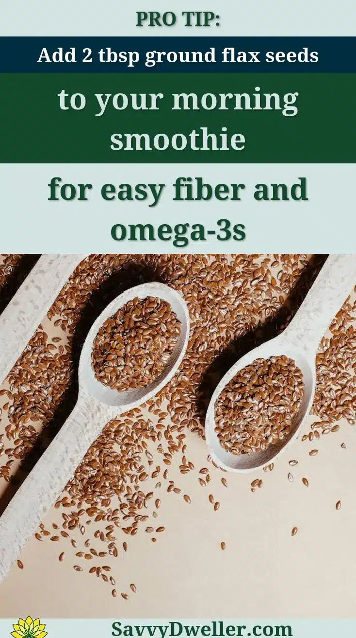 Flax seeds in two white spoons for adding to smoothies, rich in fiber and omega-3s.