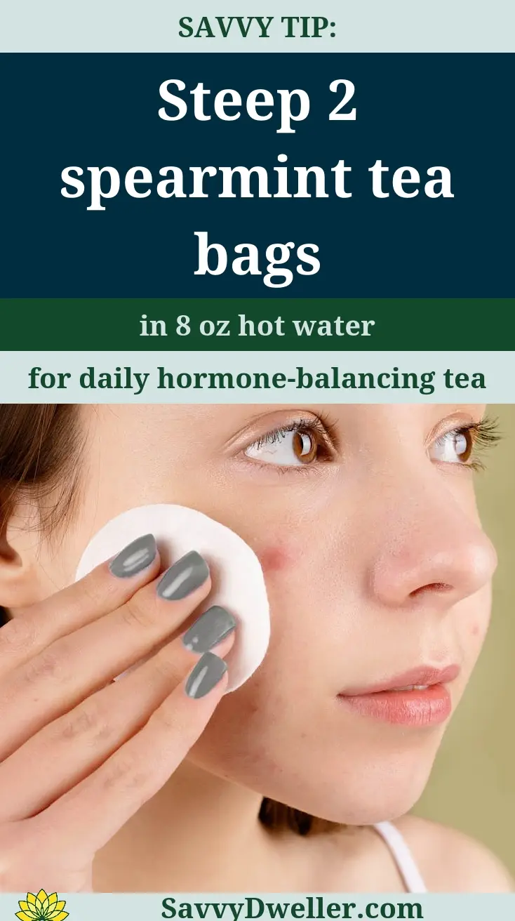 Person applying spearmint tea remedy for hormonal acne along the jawline.