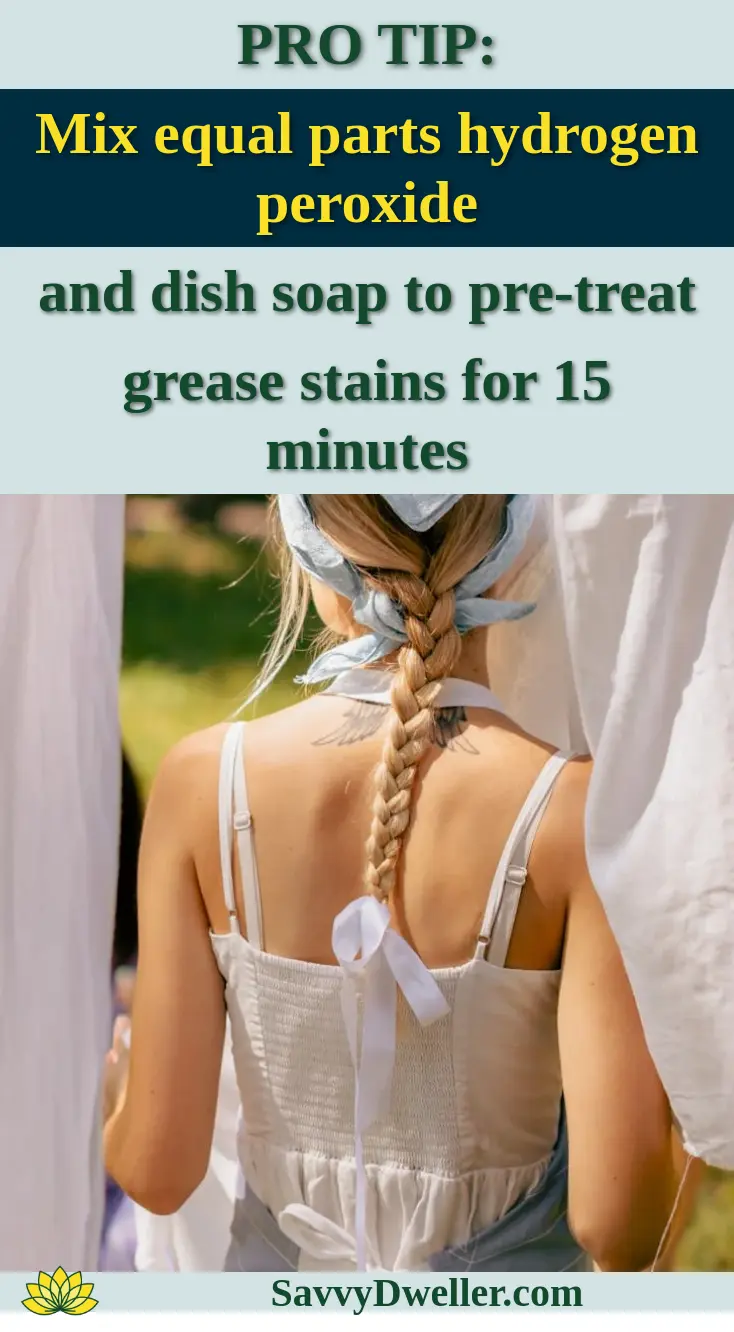 Back view of woman with braided hair in a rural outdoor setting, wearing apron.