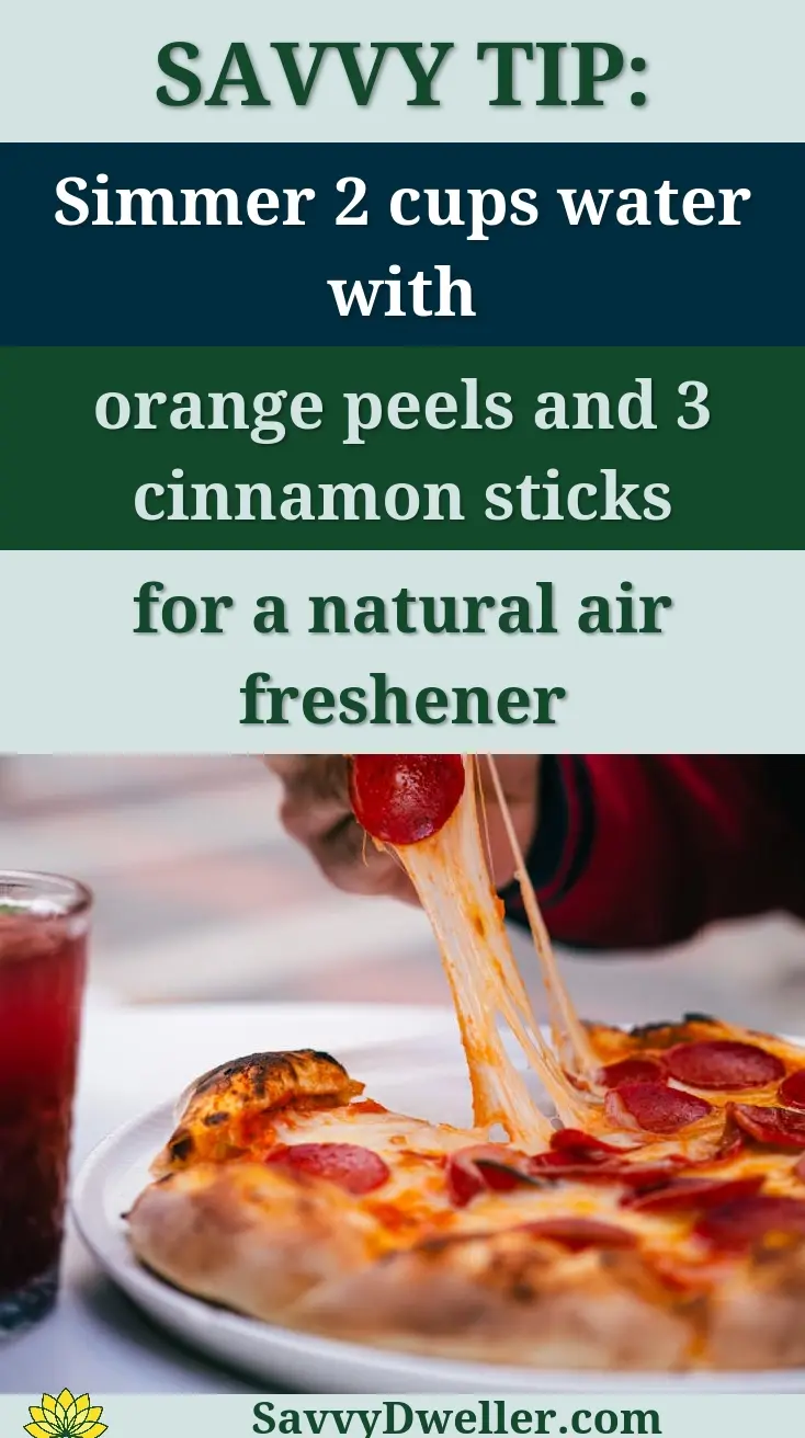 Delicious pepperoni pizza slice being pulled with gooey cheese, paired with a refreshing drink outdoors.