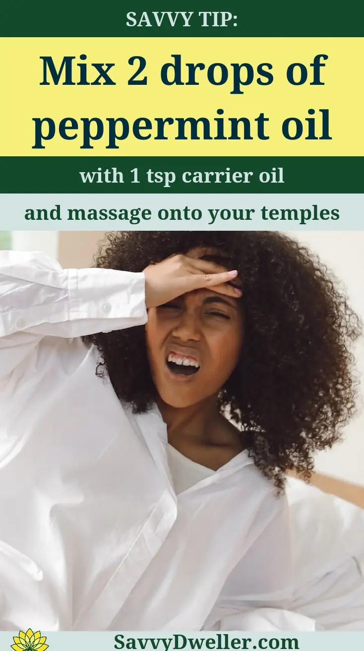 Person using peppermint oil remedy for migraine relief