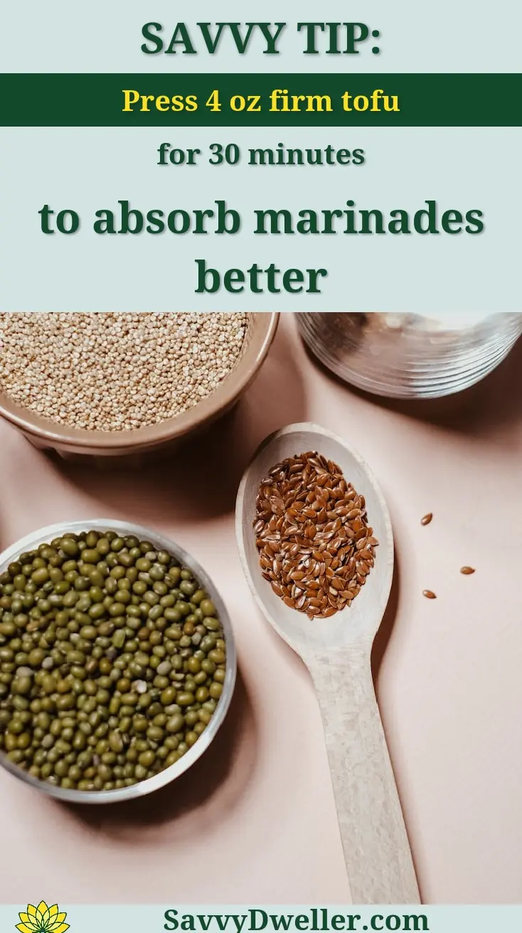 Pressing firm tofu to enhance absorption of plant-based marinades