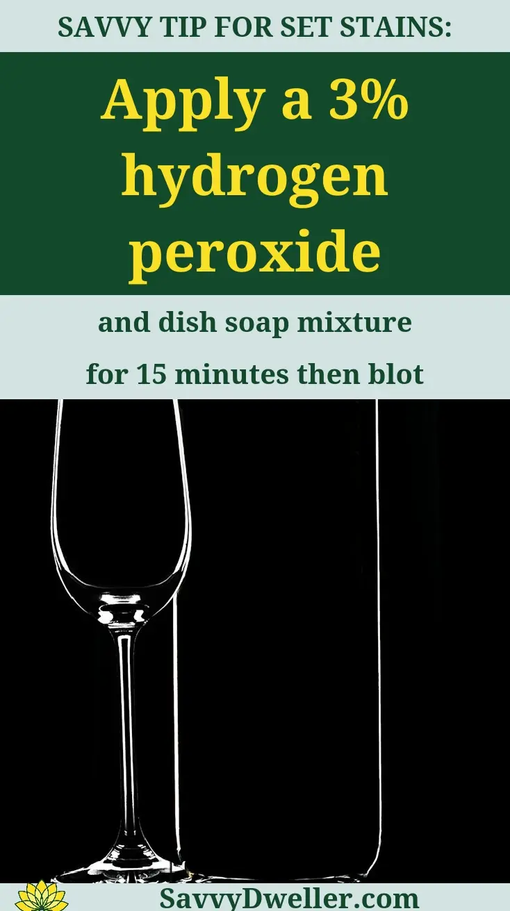 A glass of wine with a text overlay providing a tip to remove red wine stains from carpet using hydrogen peroxide.