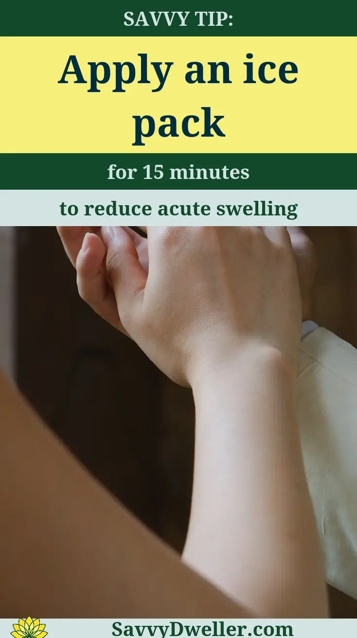 Image showing a person applying an ice pack to their wrist to relieve carpal tunnel pain.