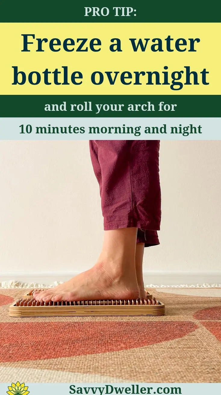 A person rolling their foot on a massage roller to relieve plantar fasciitis pain.