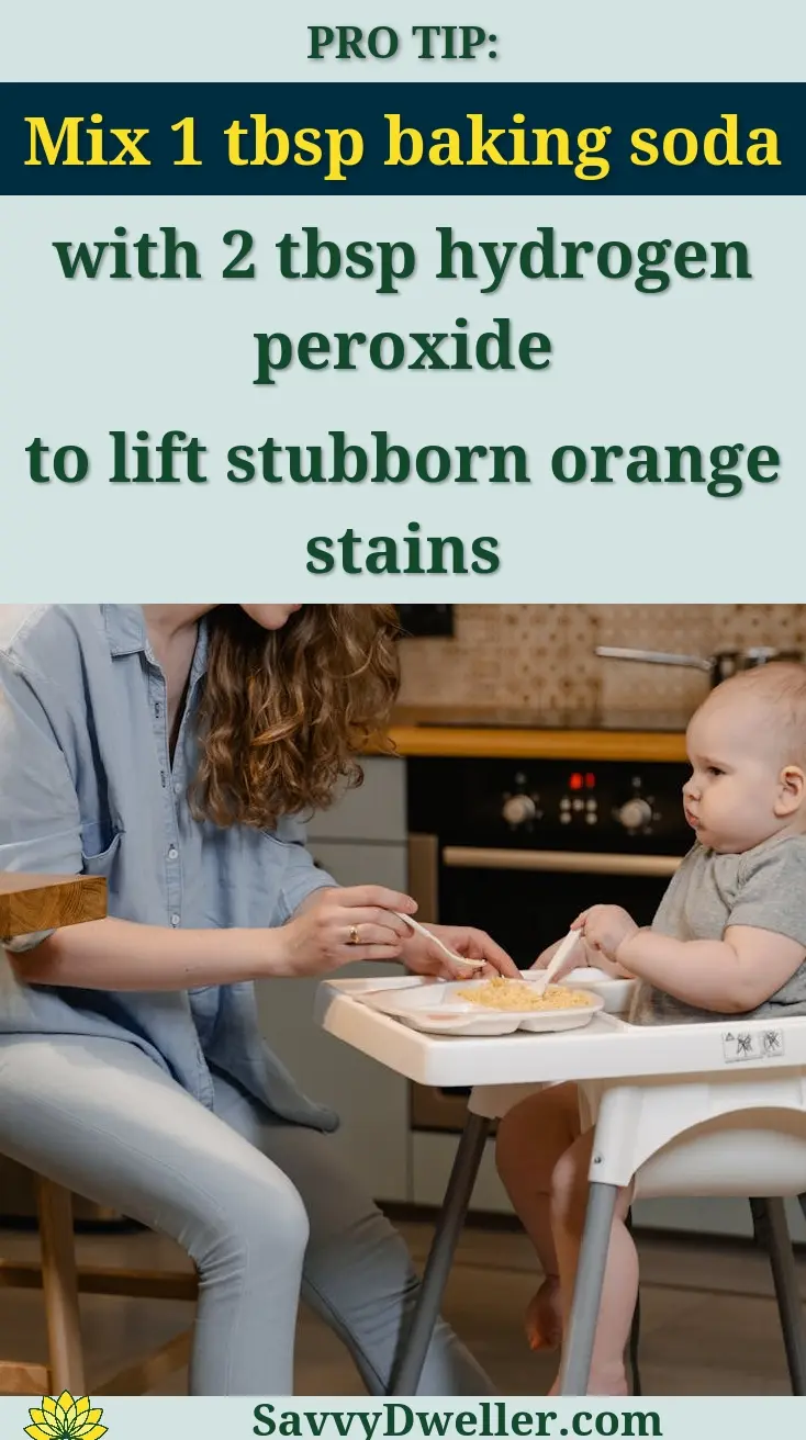 Mother feeding her baby on a high chair in a cozy home kitchen.