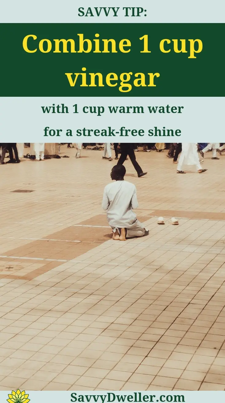 Cleaning solution recipe to remove black scuff marks from floors using vinegar and warm water.