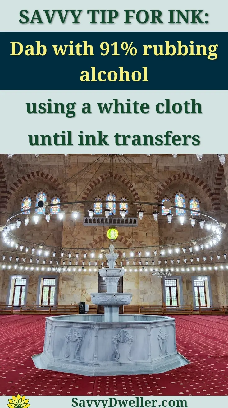 Detailed view of a mosque's intricate interior design with chandeliers and dome ceiling in Bulancak, Türkiye.