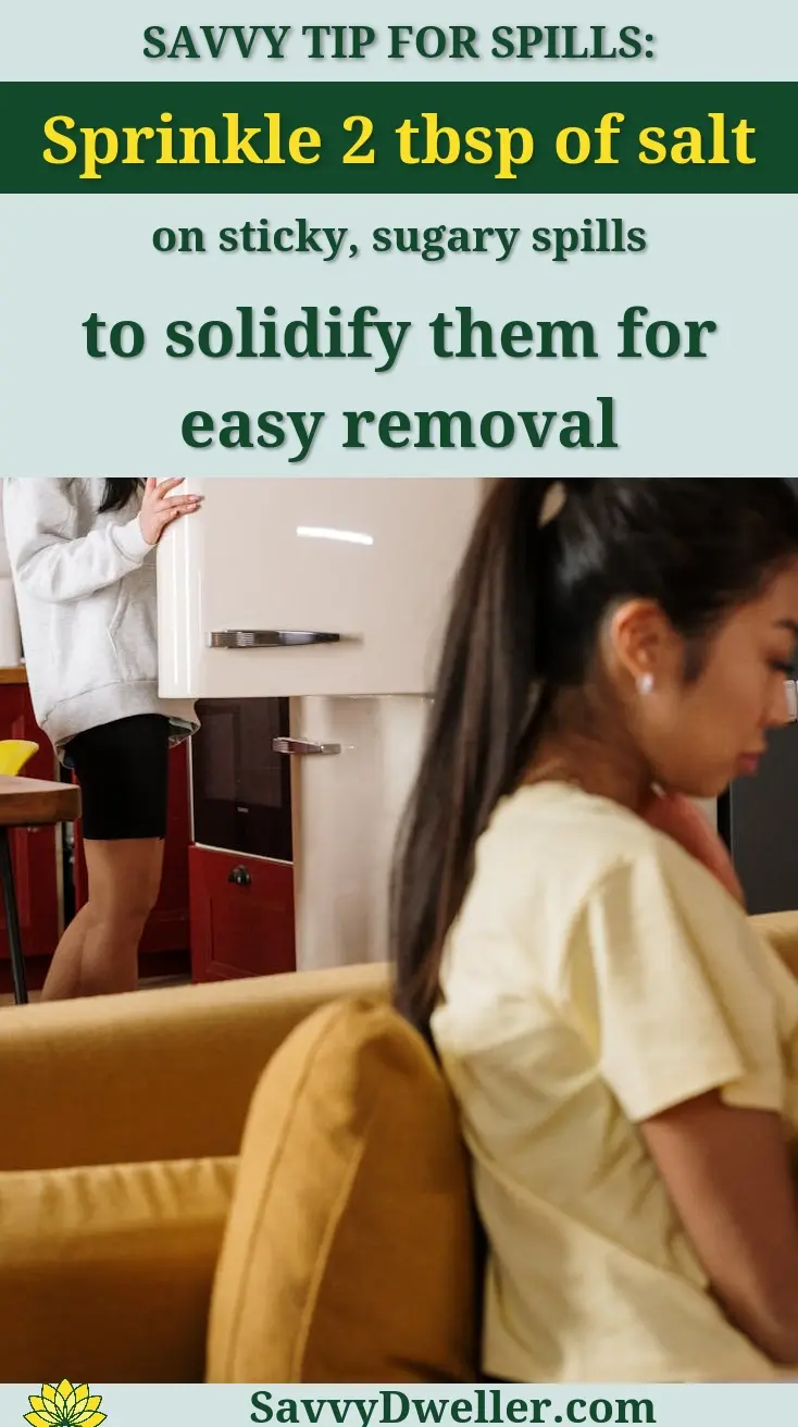 Two friends enjoying a relaxing day at home in a stylish kitchen setting.