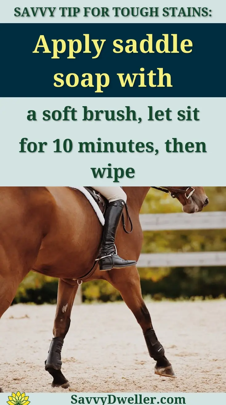 A skilled equestrian rider competes in an outdoor arena on a brown horse during daytime.