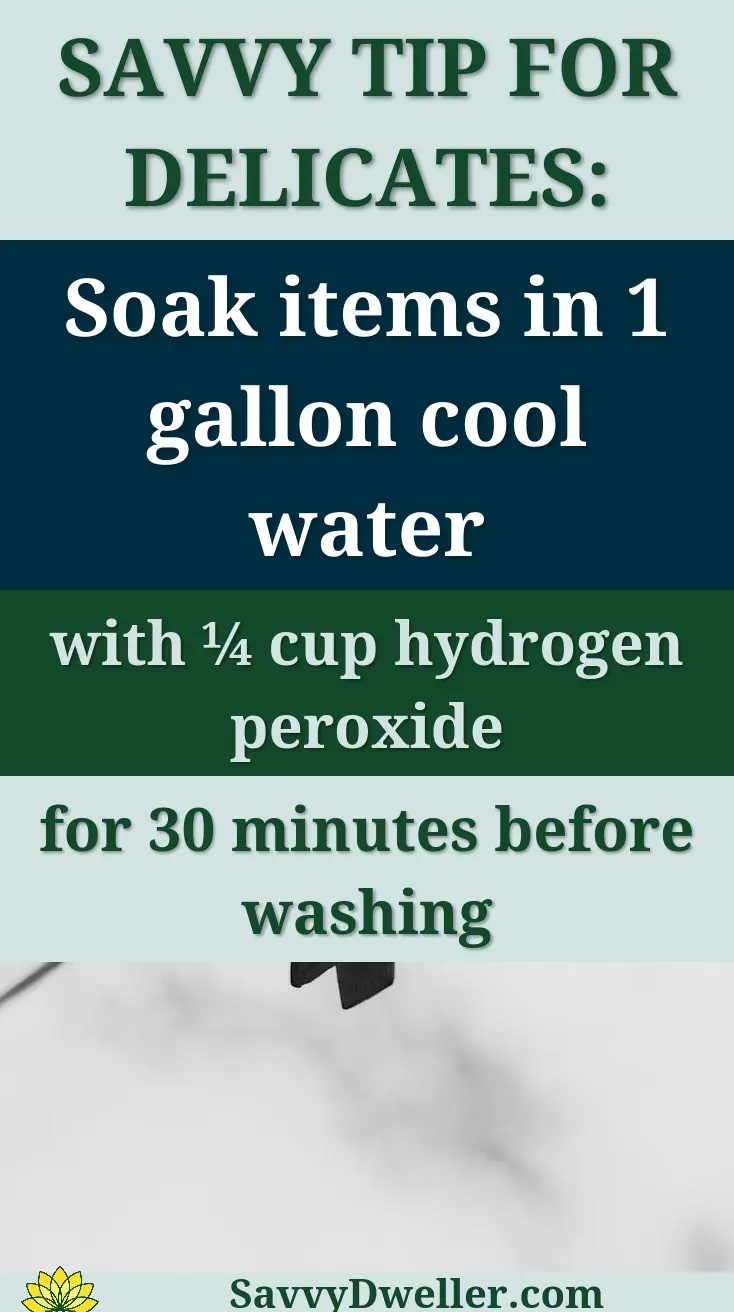 Black and white close-up of wooden clothespins on a wire outdoors.