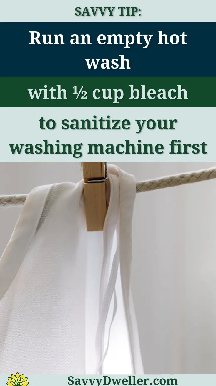 Minimalist photo of a wooden clothespin holding a white fabric on a rope, indoors.