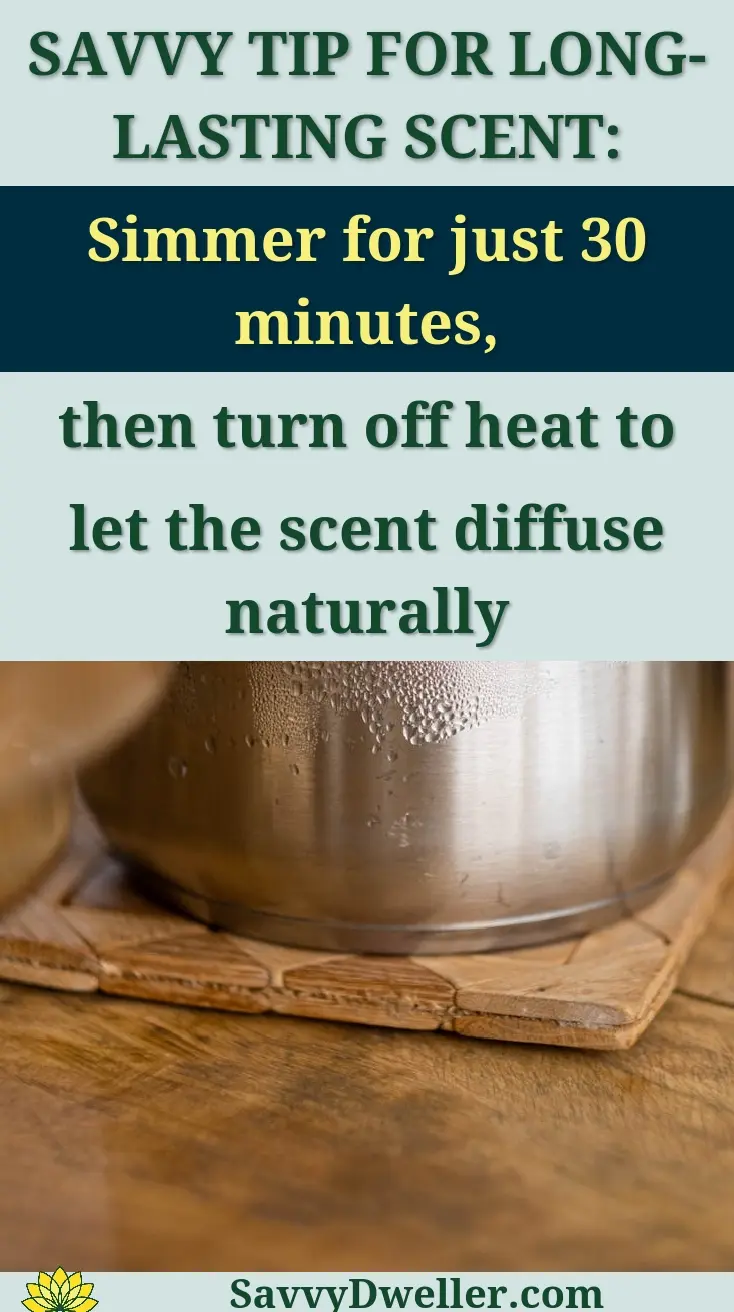 High-quality stainless steel pot with condensation indoors on a wooden surface.