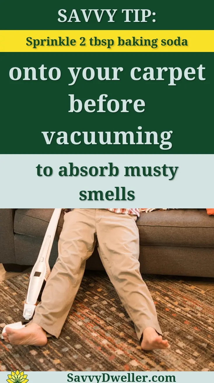 Tired adult man taking a nap on the sofa after cleaning, surrounded by orange pillows.