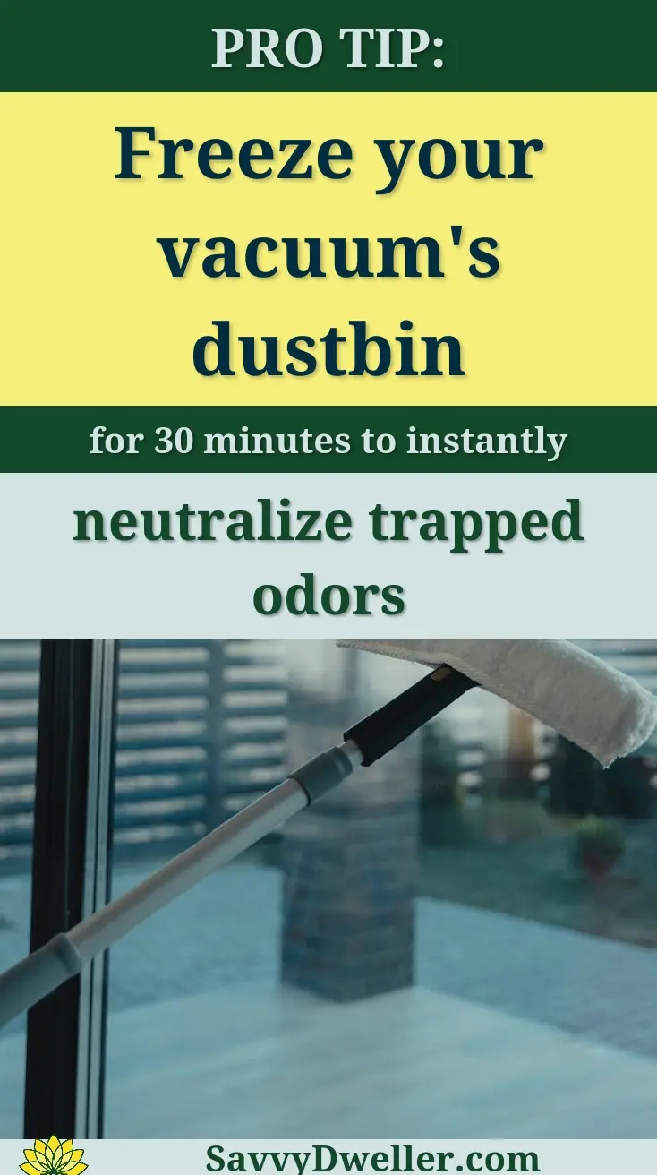 A modern cleaning tool used to clean a large glass window with a clear outdoor view.